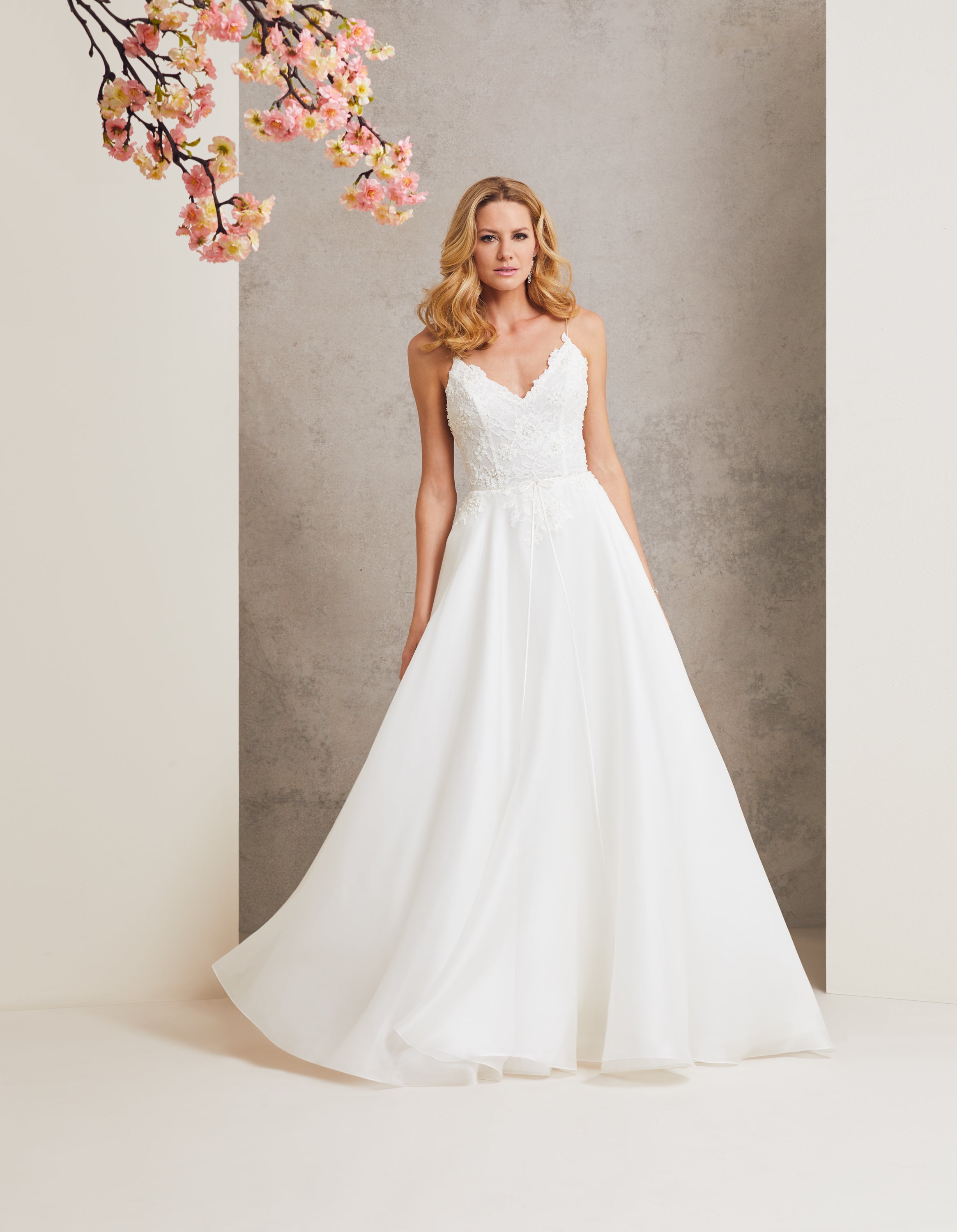 Four Seasons designer wedding dress by Caroline Castigliano