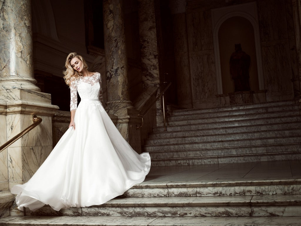 Burgundy designer wedding gown by Caroline Castigliano