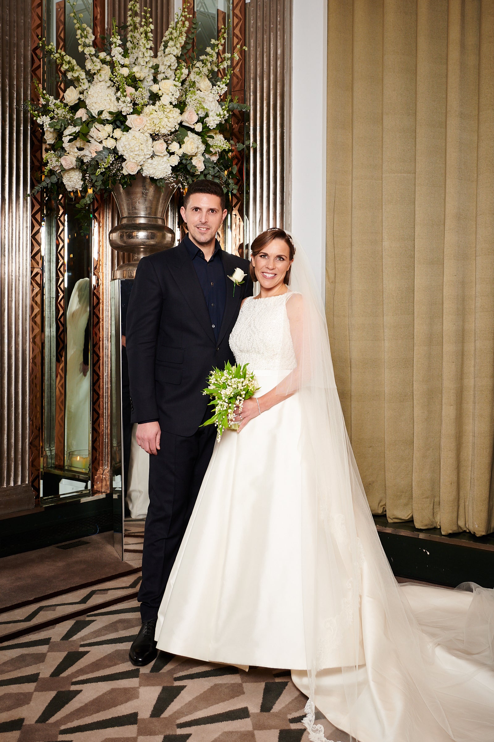Claire Williams Formula 1 in bespoke designer wedding gown by Caroline Castigliano