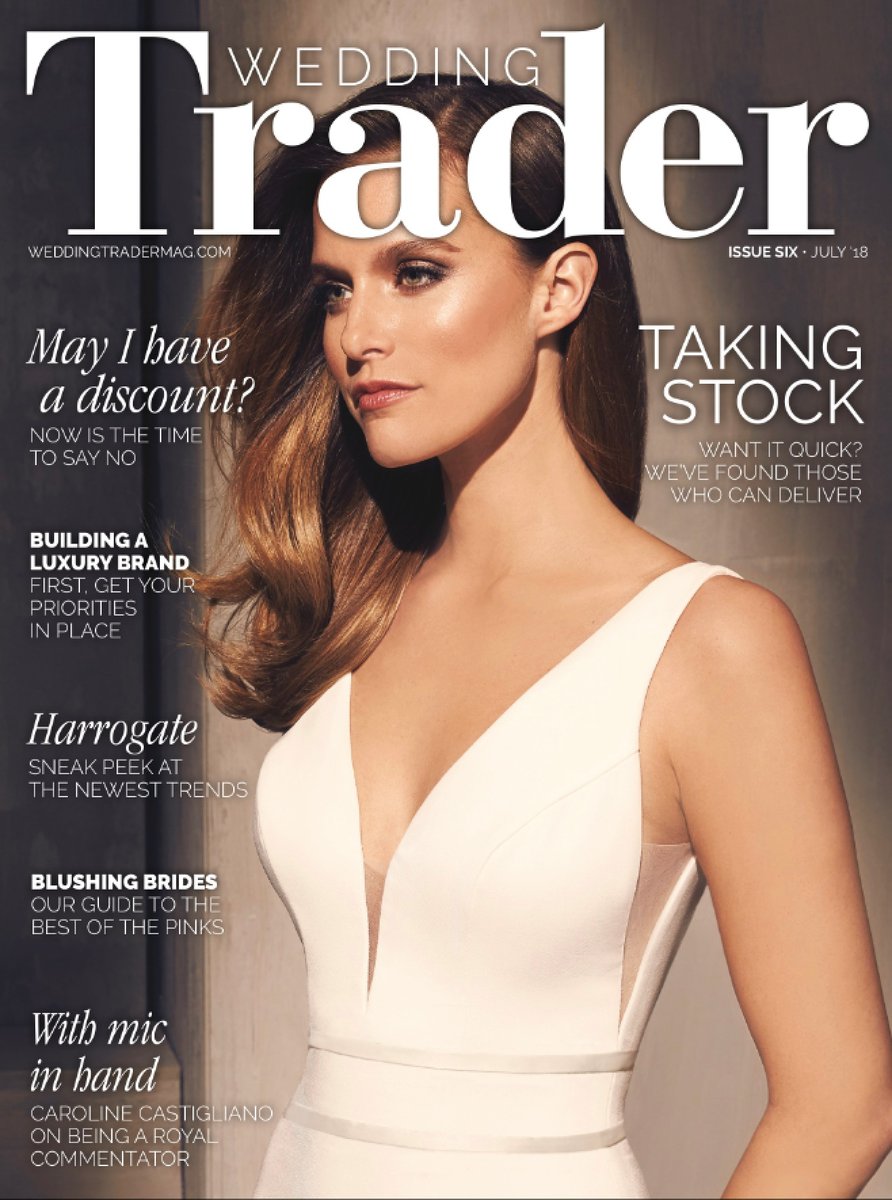 Wedding Trader Cover designer wedding gowns by Caroline Castigliano